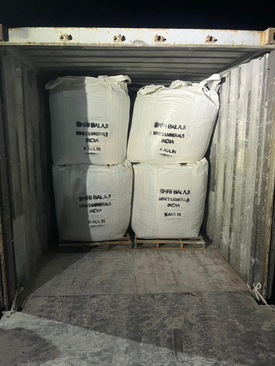 Kaolin jumbo bags loaded in shipping container for export from India by Shri Balaji Mines and Minerals