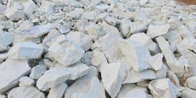 Natural talc lumps from Rajasthan India — high purity talc exported for paints rubber and cosmetics