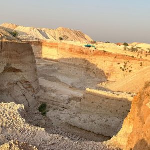 Industrial mineral mining site showing large scale extraction operations